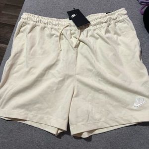 Tan Nike shorts